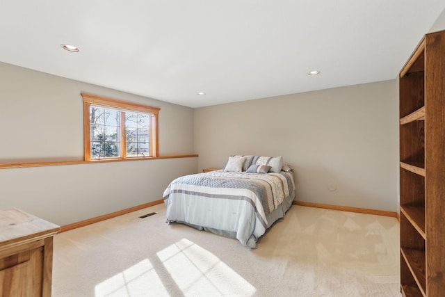 bedroom featuring recessed lighting, carpet, visible vents, and baseboards