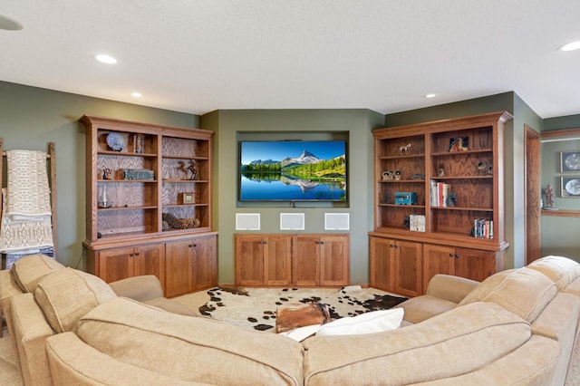 living area featuring recessed lighting