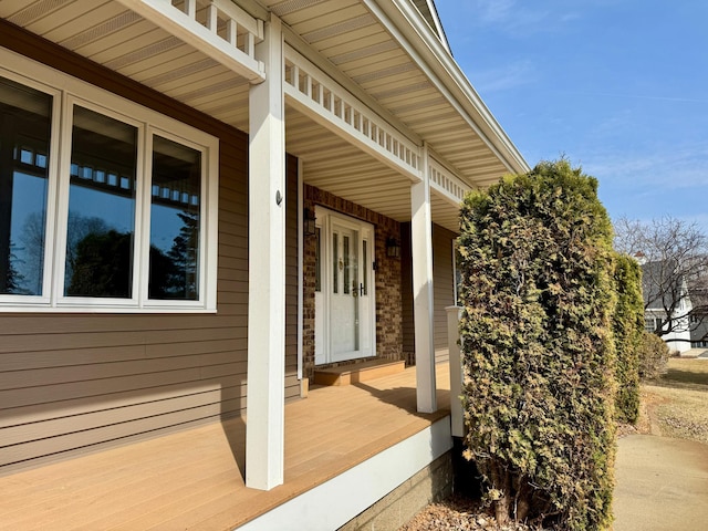 wooden terrace with covered porch