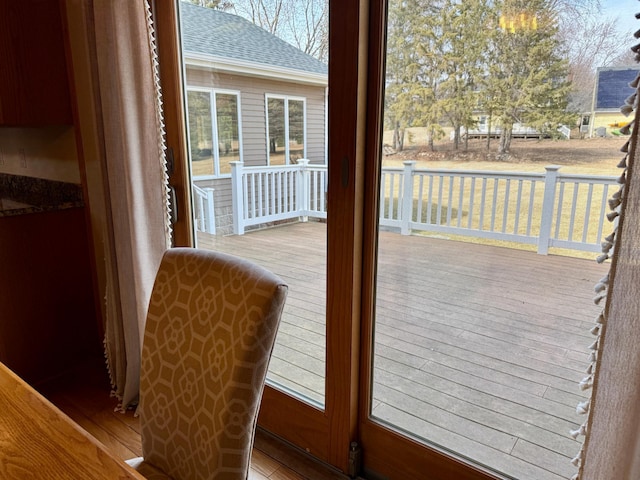 entryway with wood finished floors