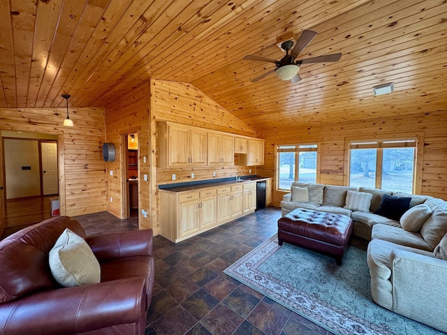 living room featuring a ceiling fan, lofted ceiling, wood ceiling, wood walls, and stone finish flooring