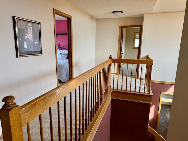 hallway with an upstairs landing