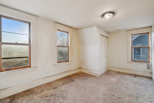 spare room featuring carpet floors