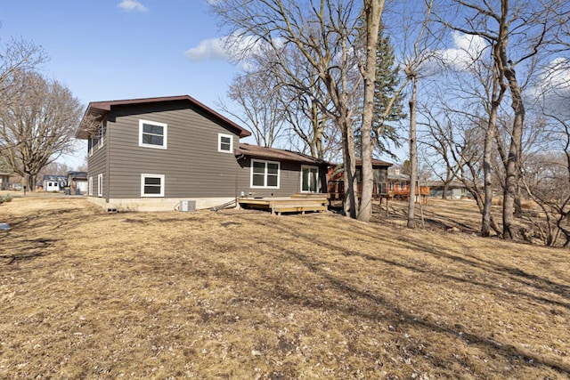 rear view of house with a deck