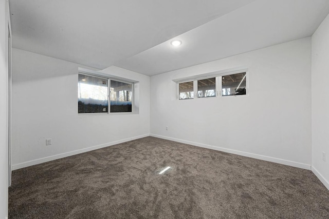 carpeted spare room with recessed lighting and baseboards