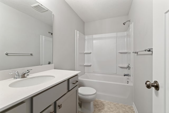 full bath featuring visible vents, a textured ceiling, toilet, and vanity