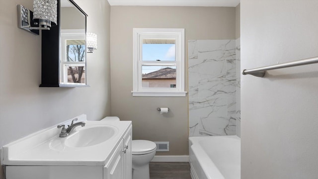 full bathroom featuring visible vents, toilet, wood finished floors, baseboards, and vanity