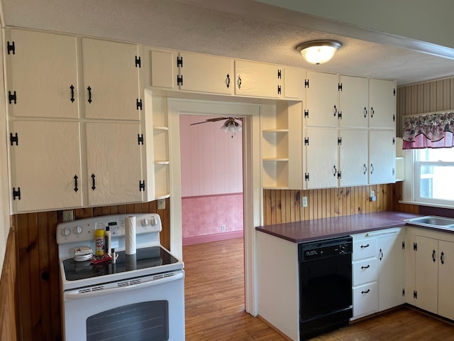 kitchen with dark countertops, dishwasher, wood finished floors, white range with electric stovetop, and open shelves