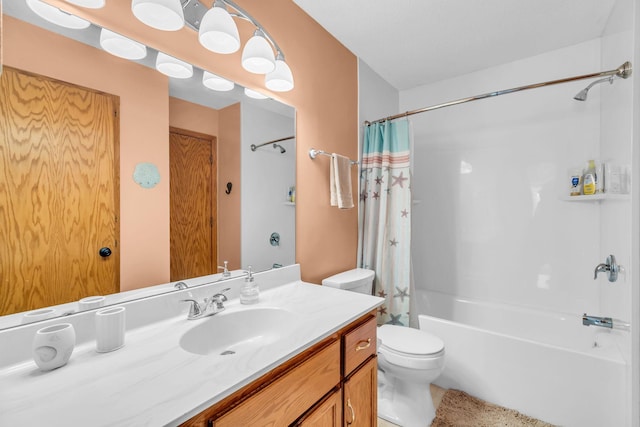 bathroom featuring toilet, shower / tub combo with curtain, and vanity
