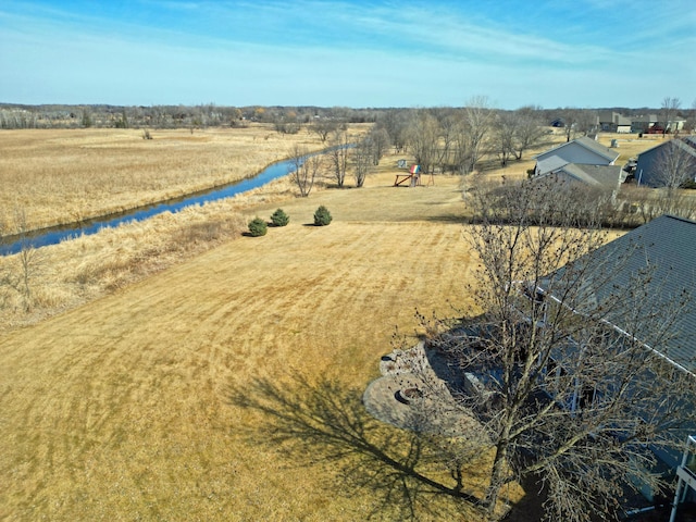 birds eye view of property featuring a rural view