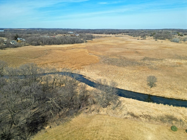 birds eye view of property featuring a rural view