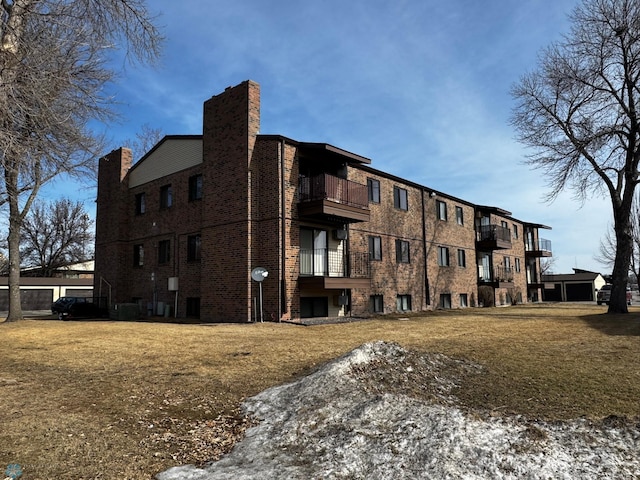 view of property featuring central AC unit