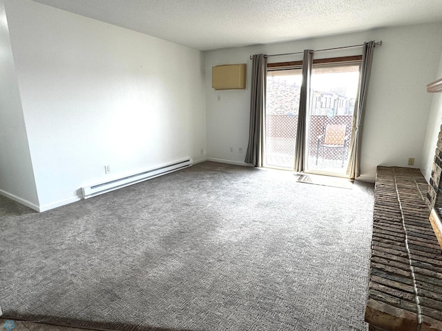 unfurnished living room with baseboard heating, a brick fireplace, carpet flooring, and a textured ceiling