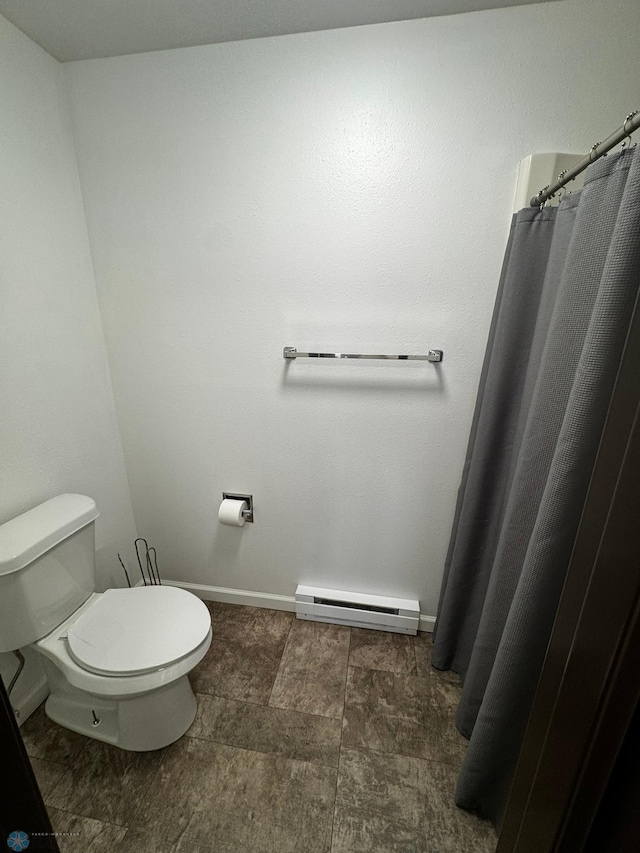 full bath featuring toilet, baseboards, and a baseboard radiator