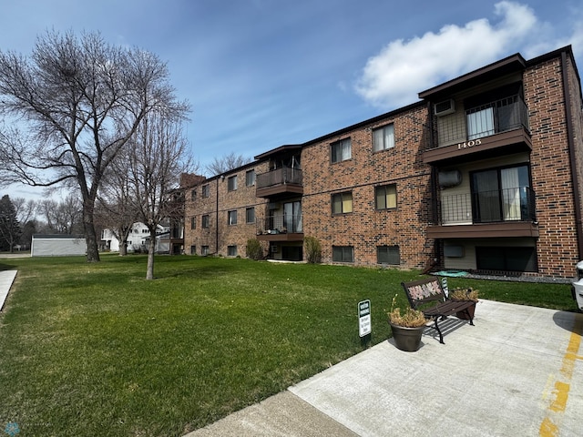 view of community featuring a yard