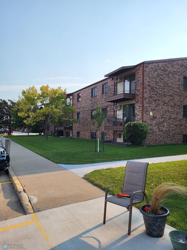 view of community featuring a lawn