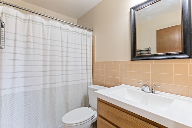 full bath featuring vanity, tile walls, toilet, and a shower with curtain