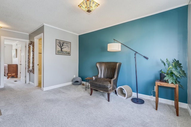 living area featuring a textured ceiling, baseboards, carpet, and ornamental molding