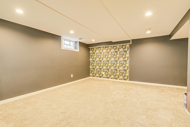 basement with carpet flooring, recessed lighting, and baseboards