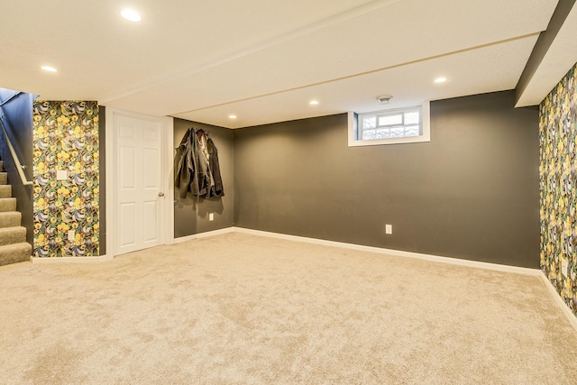 below grade area featuring recessed lighting, stairway, carpet floors, and baseboards