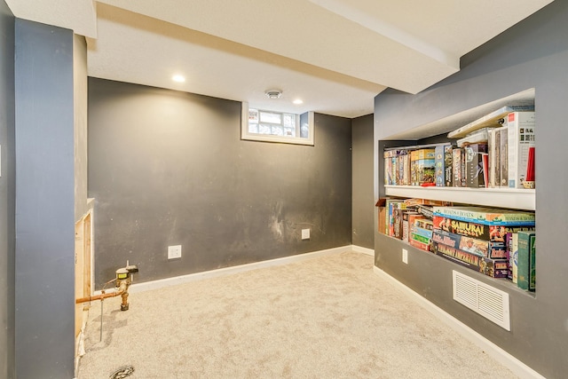 recreation room with carpet flooring and baseboards