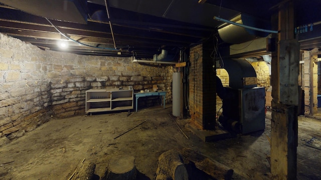 unfinished basement with gas water heater