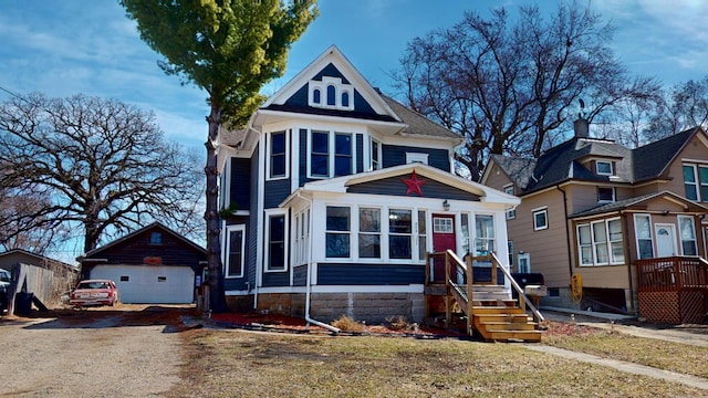 view of front of home with an outbuilding