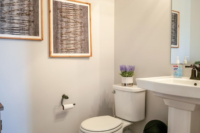 half bathroom with toilet