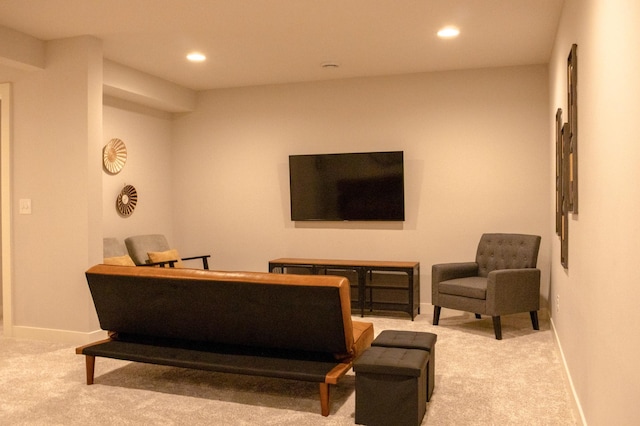 living room featuring carpet flooring, recessed lighting, and baseboards