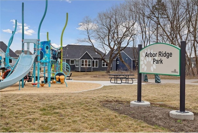 communal playground featuring a yard
