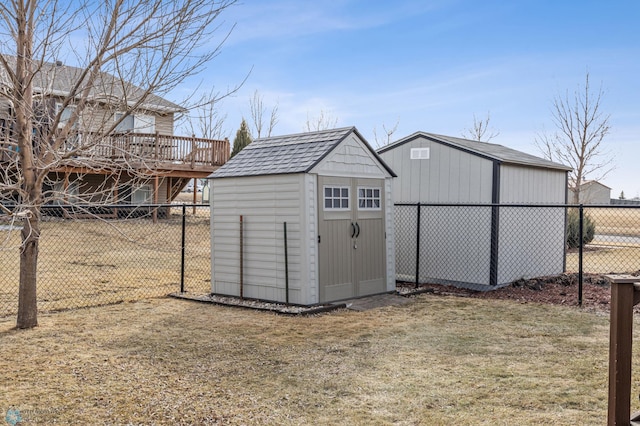 view of shed with a fenced backyard