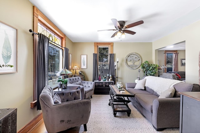 living room featuring ceiling fan