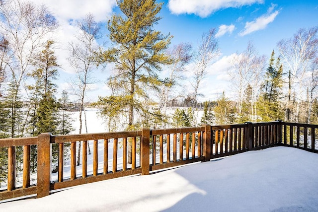 view of snow covered deck