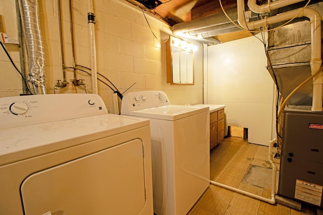 washroom featuring independent washer and dryer and laundry area