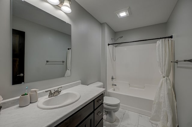 full bath with marble finish floor, vanity, toilet, and shower / tub combo