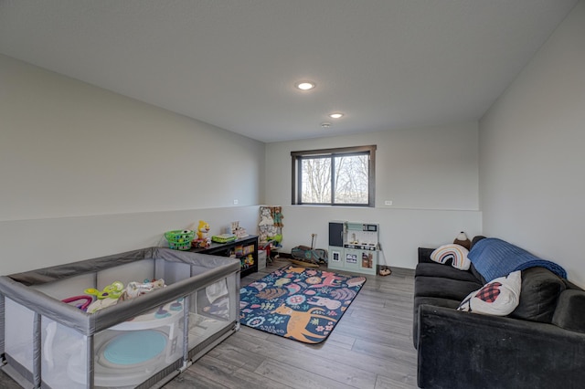 living room featuring recessed lighting and wood finished floors