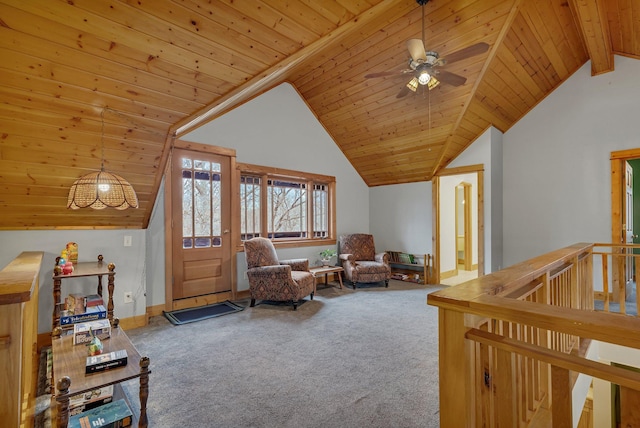 sitting room featuring carpet flooring, a ceiling fan, an upstairs landing, wooden ceiling, and vaulted ceiling