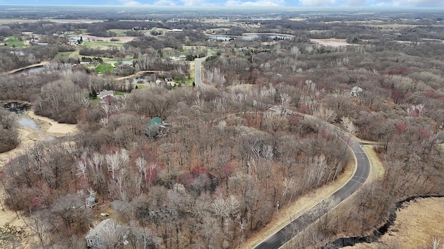 aerial view with a wooded view