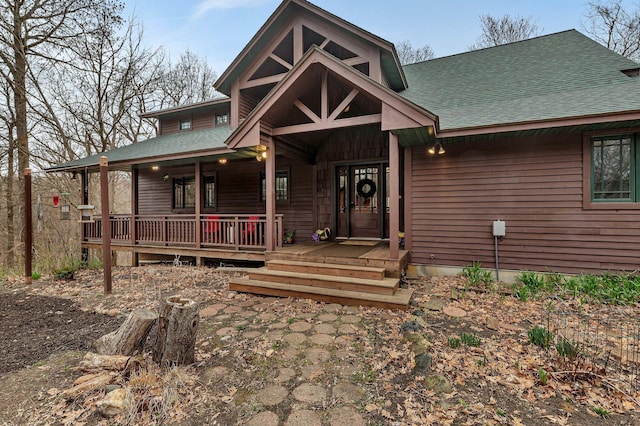 1356 119th St NW, Silver Creek Twp, MN 55362 - chalet / cabin featuring a porch and roof with shingles