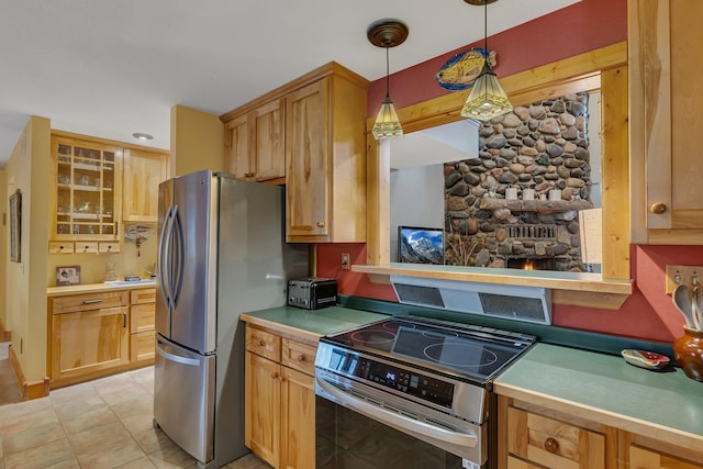 1356 119th St NW, Silver Creek Twp, MN 55362 - kitchen with light countertops, stainless steel appliances, pendant lighting, and glass insert cabinets
