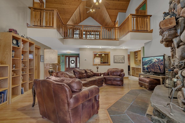 1356 119th St NW, Silver Creek Twp, MN 55362 - living area featuring a ceiling fan, light wood finished floors, wood ceiling, and high vaulted ceiling