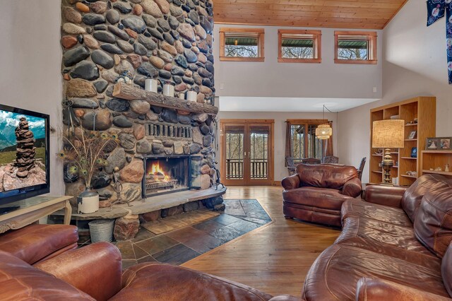 1356 119th St NW, Silver Creek Twp, MN 55362 - living area featuring a fireplace, high vaulted ceiling, wood ceiling, and wood finished floors