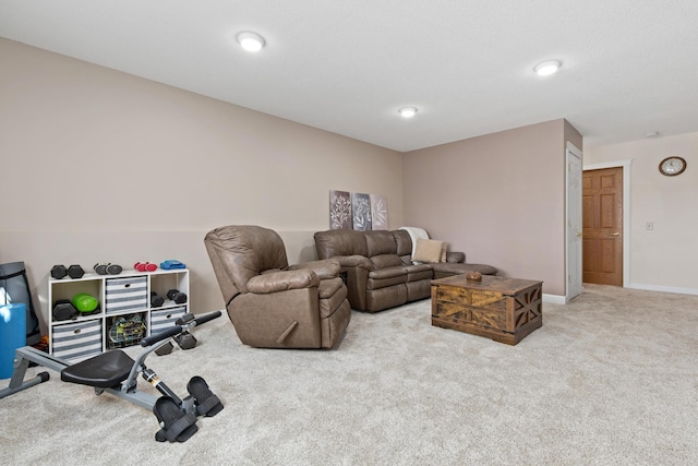 living room with carpet flooring and baseboards