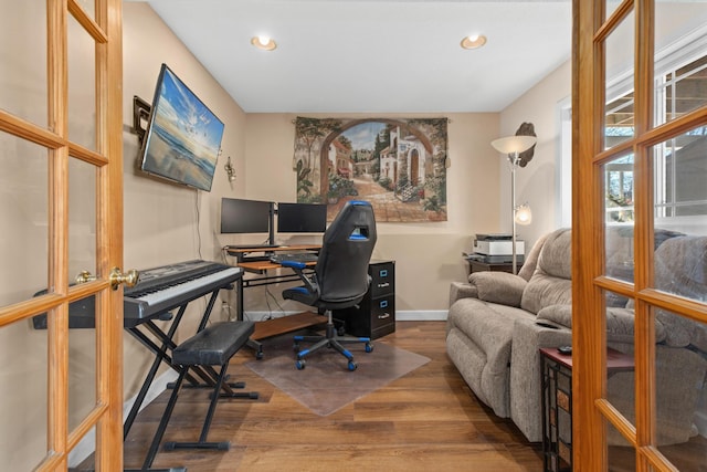 office area featuring recessed lighting, wood finished floors, and baseboards