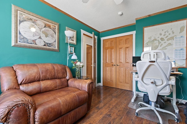 office featuring dark wood-style floors, a textured ceiling, baseboards, and ornamental molding