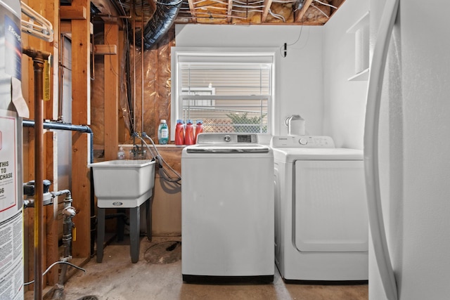 laundry area featuring laundry area and washing machine and dryer