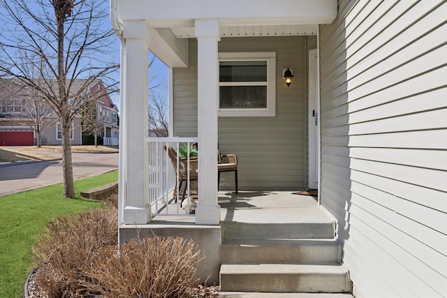 property entrance featuring covered porch