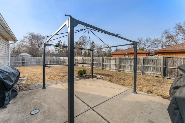 view of patio featuring area for grilling and a fenced backyard