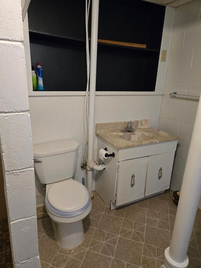 half bath with vanity and toilet