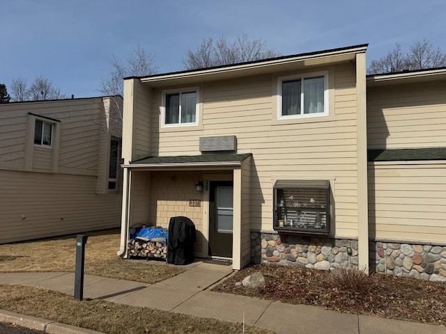 view of front of property featuring stone siding